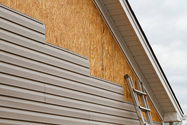 Professional Vinyl Siding technician working in Coppell, TX